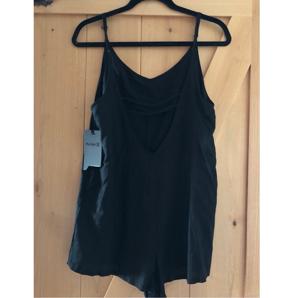 SOLD Romper- cute back detail